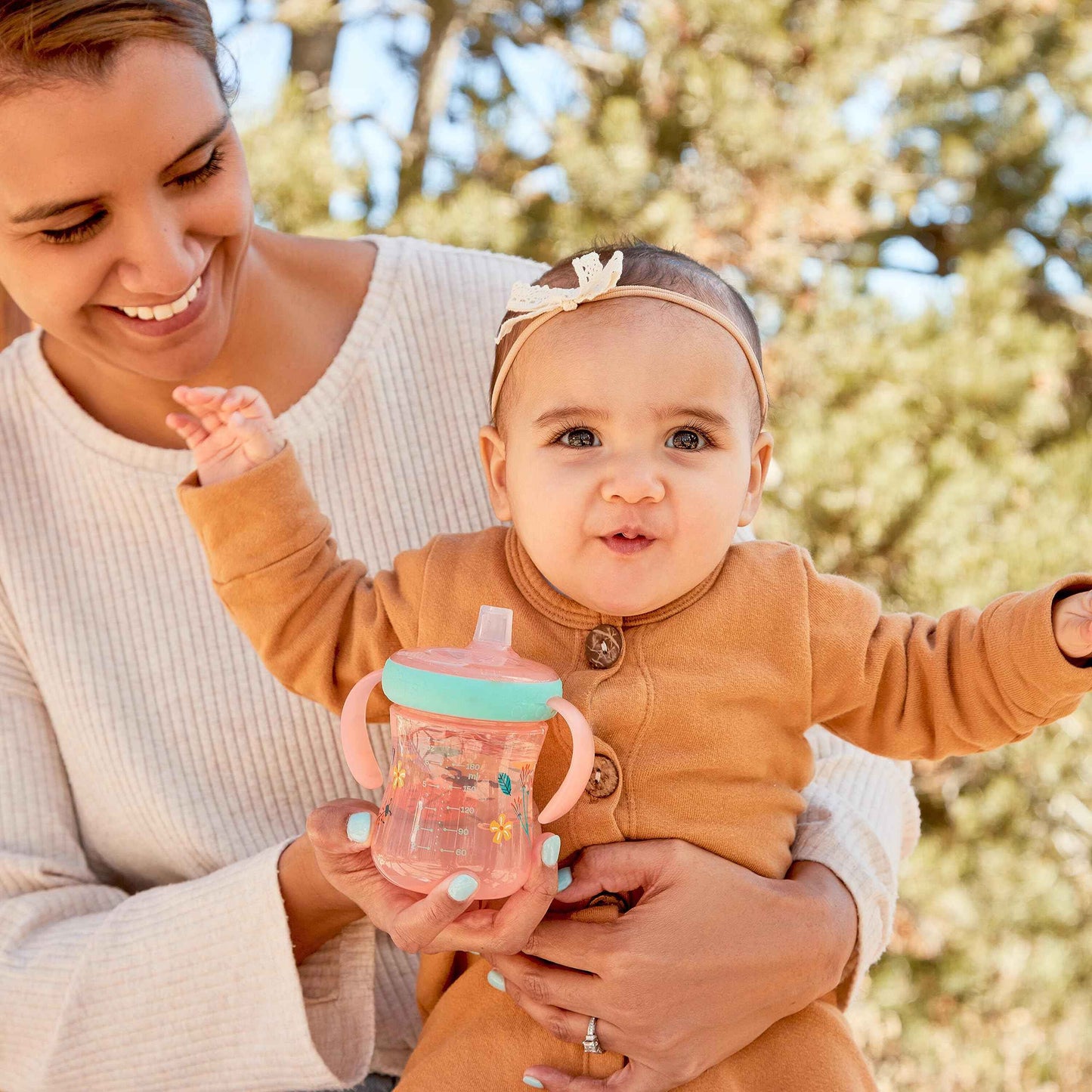 The First Years - Soft Spout Sippy Cup - Toddler Trainer Cup for 6+ Months -With Handles and Leak Proof Lid - 7 Oz - Floral Ladybug Print - 2 Count